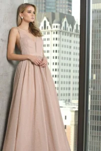 Blush shimmer gown with a plunge neck and glitter tulle skirt